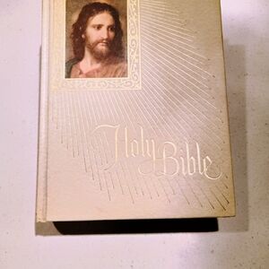 Gold Holy Bible with Jesus Portrait